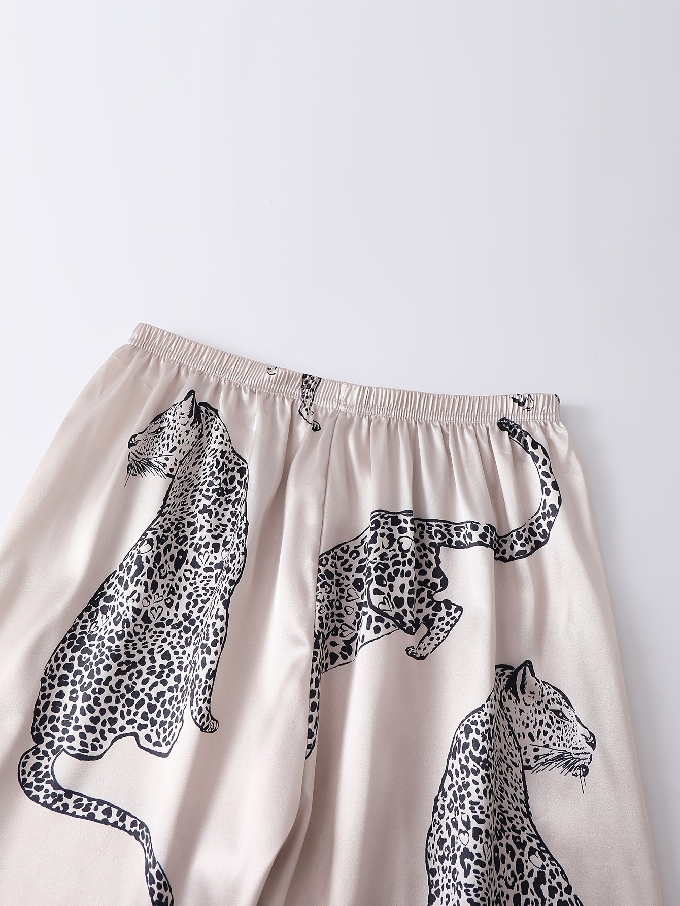 Womenβs Premium Satin Night Suit Set β Pack of 2 (Blush Pink & Beige Leopard Print)